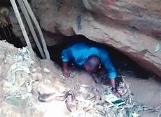 an adventurer crawling out of one of the ogbunike tunnels